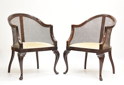 Lot 675 - Pair of early 20th century mahogany bergere tub chairs