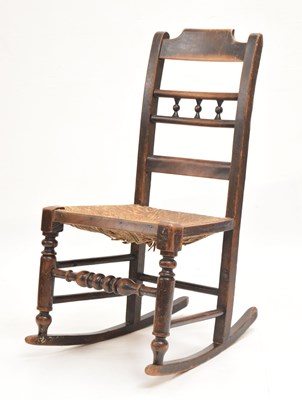 Lot 676 - Small 19th century rush-seated rocking chair