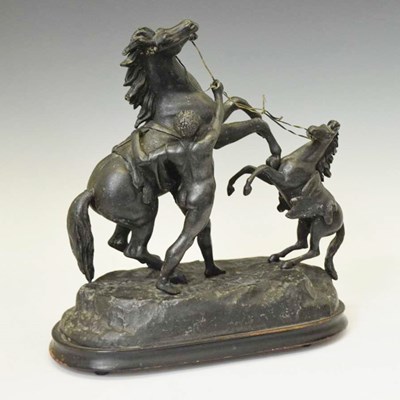 Lot 332 - Spelter group of two Marley horses with handler