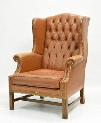 Lot 683 - 20th century deep buttoned wingback