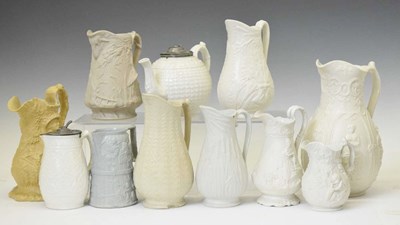 Lot 425 - Collection of 19th century and later relief-moulded stoneware jugs etc