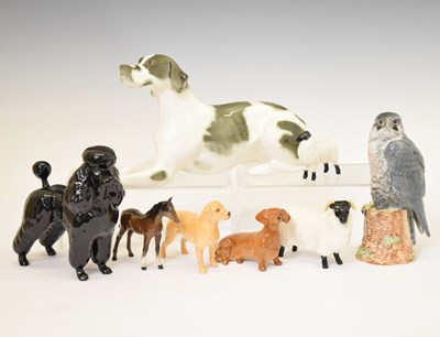 Lot 442 - USSR porcelain recumbent dog, and a quantity of Beswick figures