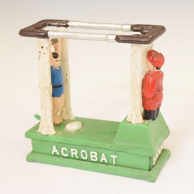 Lot 263 - Reproduction cast iron mechanical money box of an acrobat on the balance bars
