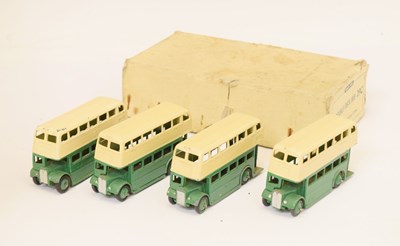 Lot 313 - Dinky Toys - Boxed set 29c containing four green and cream double decker buses