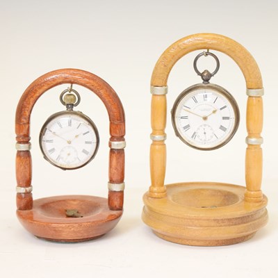Lot 89 - Two silver open face pocket watches and holders