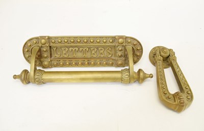 Lot 232 - Late Victorian or Edwardian gilt metal letter box and door knocker en-suite