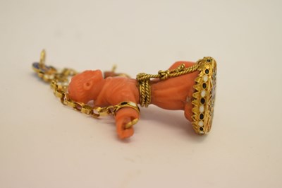 Lot 292 - Southern Italian carved coral and enamel figural pendant