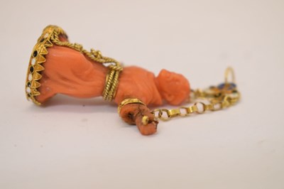Lot 292 - Southern Italian carved coral and enamel figural pendant