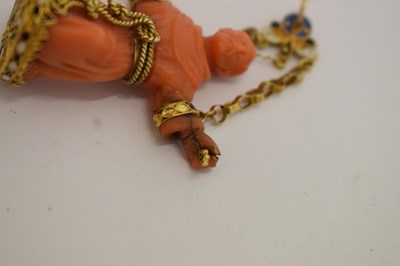 Lot 292 - Southern Italian carved coral and enamel figural pendant