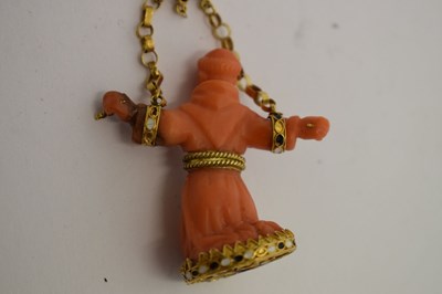 Lot 292 - Southern Italian carved coral and enamel figural pendant