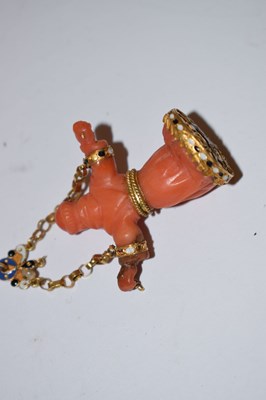 Lot 292 - Southern Italian carved coral and enamel figural pendant