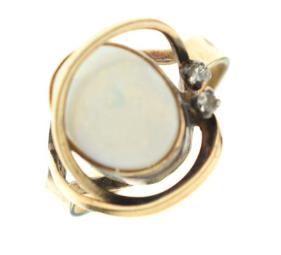 Lot 54 - Modernist gold ring set opal cabochon and two small diamonds