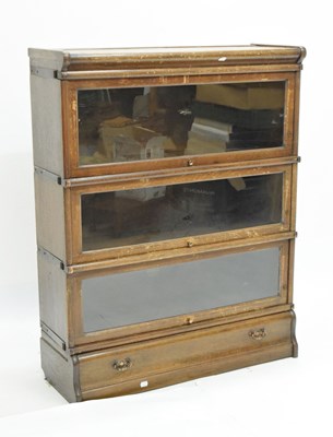 Lot 656 - Globe Wernicke three-section oak modular bookcase