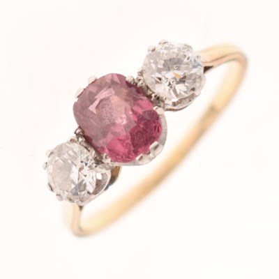 Lot 40 - Pink stone and diamond three-stone ring