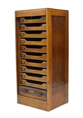 Lot 655 - Angus of London oak tambour front filing cabinet