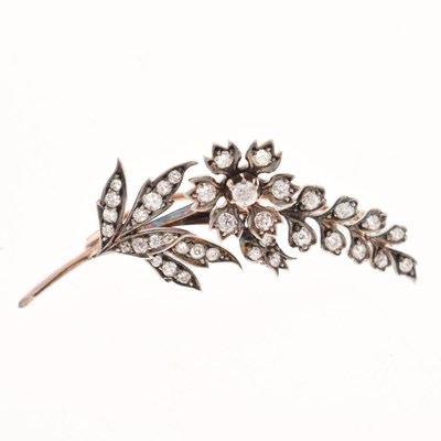 Lot 46 - Diamond set flower brooch