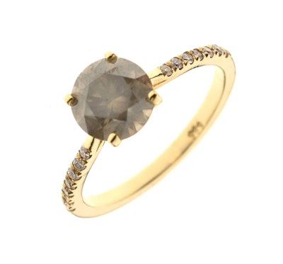 Lot 96 - Diamond single stone ring with seven small diamonds to each shoulder