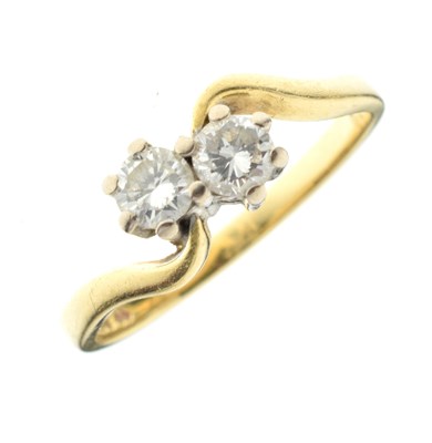 Lot 27 - 18ct gold two-stone diamond ring