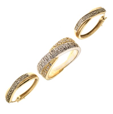 Lot 4 - 18ct two-colour gold diamond set crossover dress ring