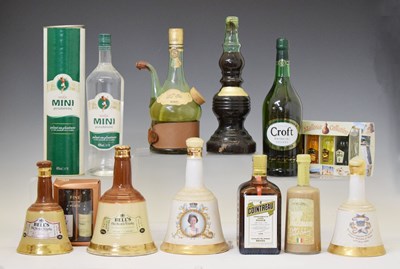 Lot 812 - Three Bells whisky decanters, a selection of miniatures and liquors, etc
