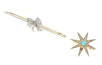 Lot 47 - '15c Pt' bar brooch having a diamond set bow