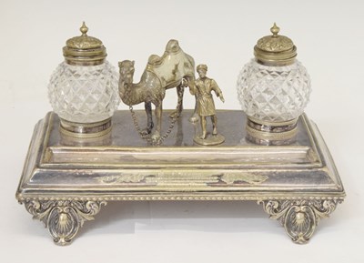 Lot 344 - Late Victorian silver plate deskstand with camel surmount