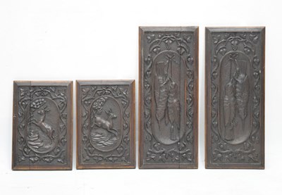 Lot 345 - Two pairs of carved oak panels