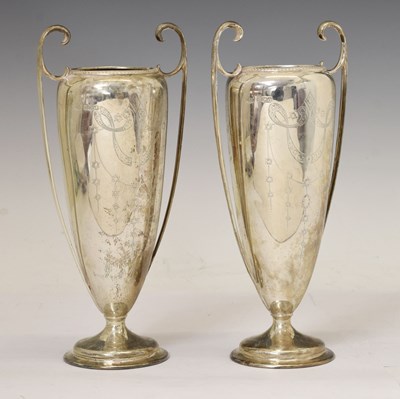 Lot 73 - Pair of George V silver twin-handled vases