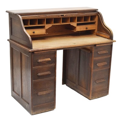 Lot 777 - Early 20th century oak tambour-top twin pedestal desk