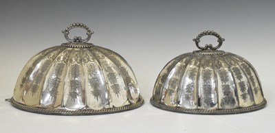 Lot 351 - Two 19th century silver plated meat covers