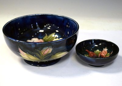 Lot 390 - Moorcroft pottery Hibiscus pattern bowl and smaller Clematis bowl