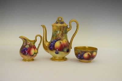 Lot 339 - George V Royal Worcester porcelain fruit-painted coffee pot, cream jug and sugar basin