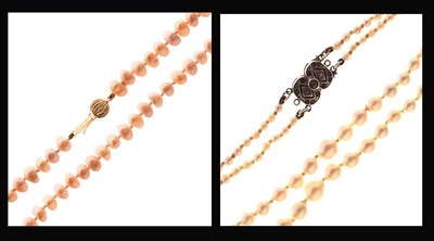 Lot 63 - Long row of pink tinted freshwater pearls