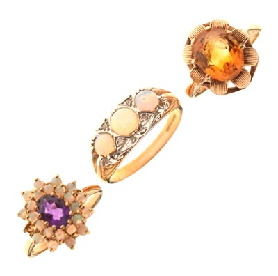 Lot 26 - Three 9ct gold gem-set dress rings