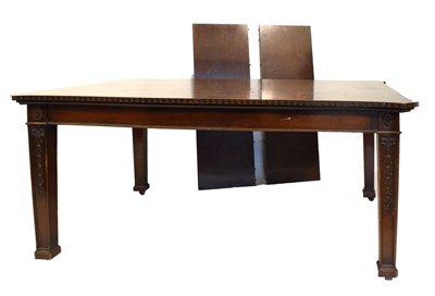 Lot 731 - Large Sheraton Revival mahogany wind-out extending dining table with two leaves