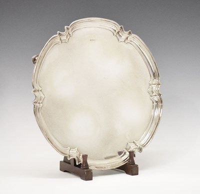 Lot 108 - Elizabeth II silver salver with lobbed and readed edge standing on three cast feet