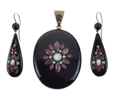 Lot 55 - Victorian black enamel and gem set oval pendant