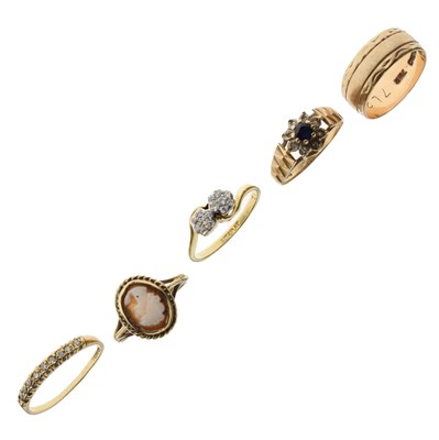 Lot 23 - Four 9ct gold rings, and another