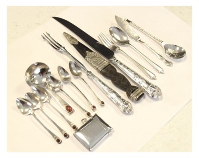 Lot 165 - Set of six Elizabeth II silver teaspoons set cabochon with matching caddy spoon