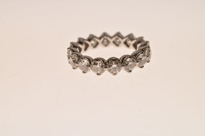 Lot 9 - De Beers Allegria diamond platinum full eternity ring
