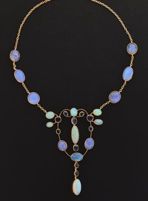 Lot 28 - Opal and sapphire pendant necklace in the Arts and Crafts manner