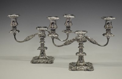 Lot 110 - Pair of Elizabeth II silver three-light, two-branch candelabra