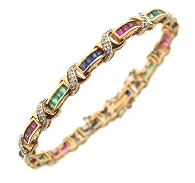 Lot 35 - Diamond, ruby, sapphire and emerald yellow metal bracelet