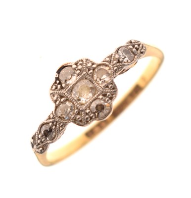 Lot 24 - Yellow metal (18ct), platinum and diamond cluster ring