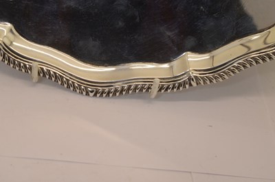 Lot 106 - Victorian silver salver with gadroon edge and standing on four ball and claw feet