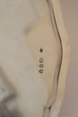 Lot 106 - Victorian silver salver with gadroon edge and standing on four ball and claw feet