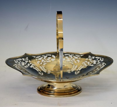 Lot 271 - George V silver basket with swing handle