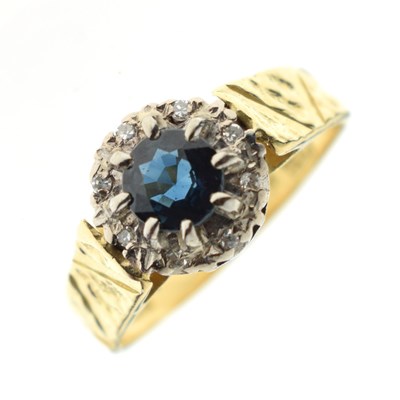 Lot 29 - 18ct gold sapphire and diamond cluster ring