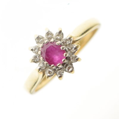 Lot 28 - 18ct gold, ruby and diamond cluster ring