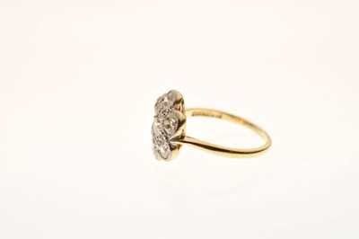 Lot 11 - Diamond 18ct yellow gold and platinum flower head ring